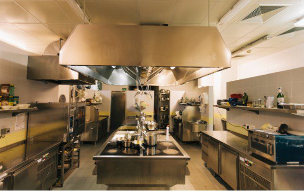 Commercial Kitchen with Yellow Lighting