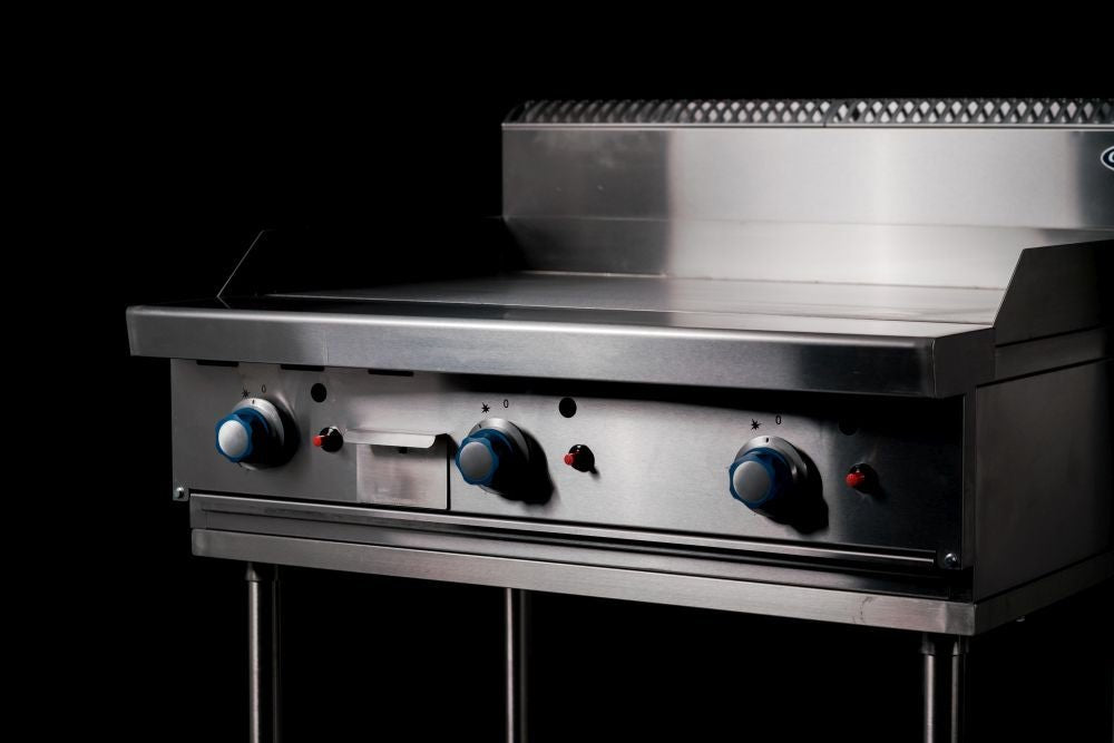 Cookrite AT80G9G gas griddle — front drip tray removed for cleaning